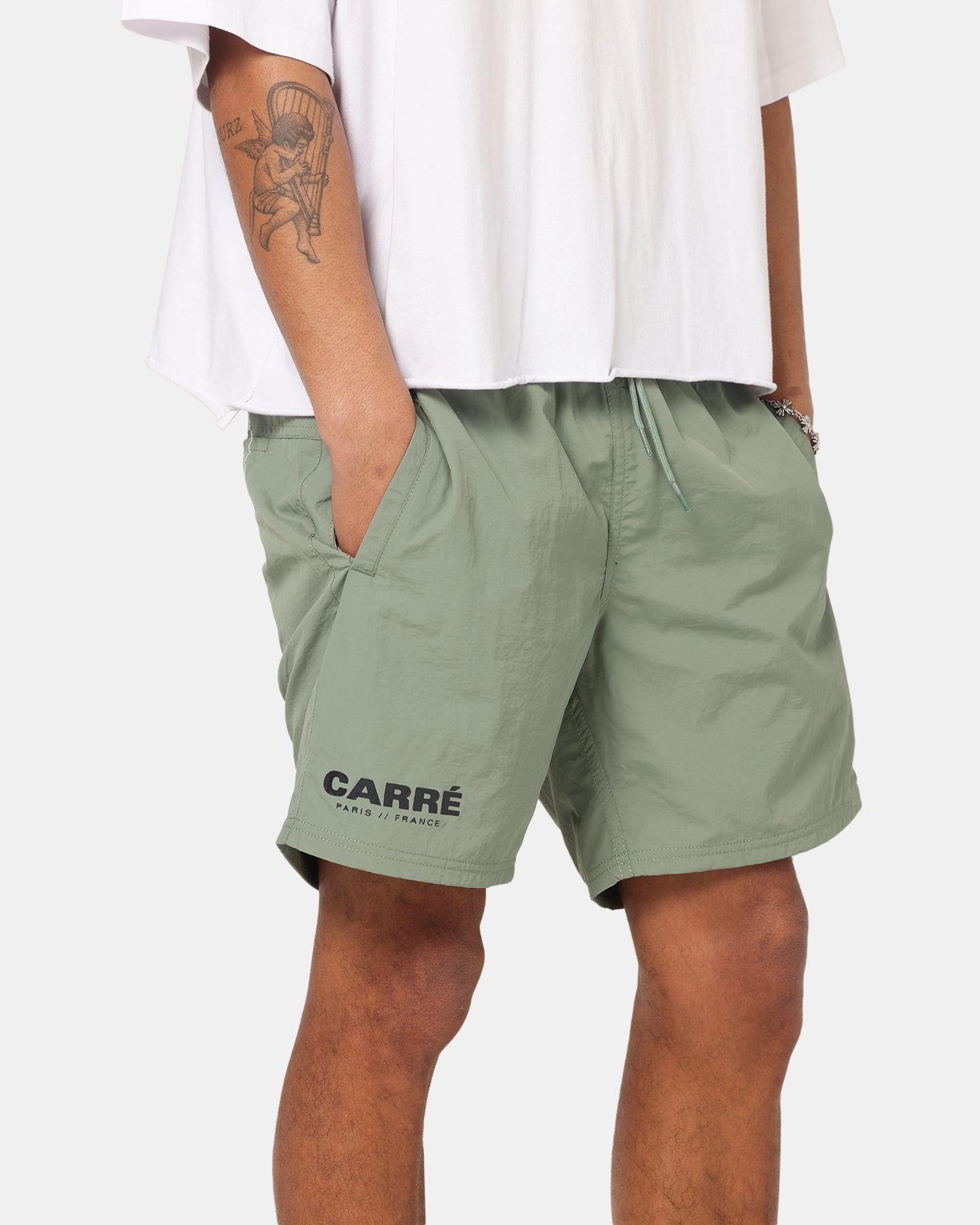 music event look Carre Motion Beach Shorts Khaki