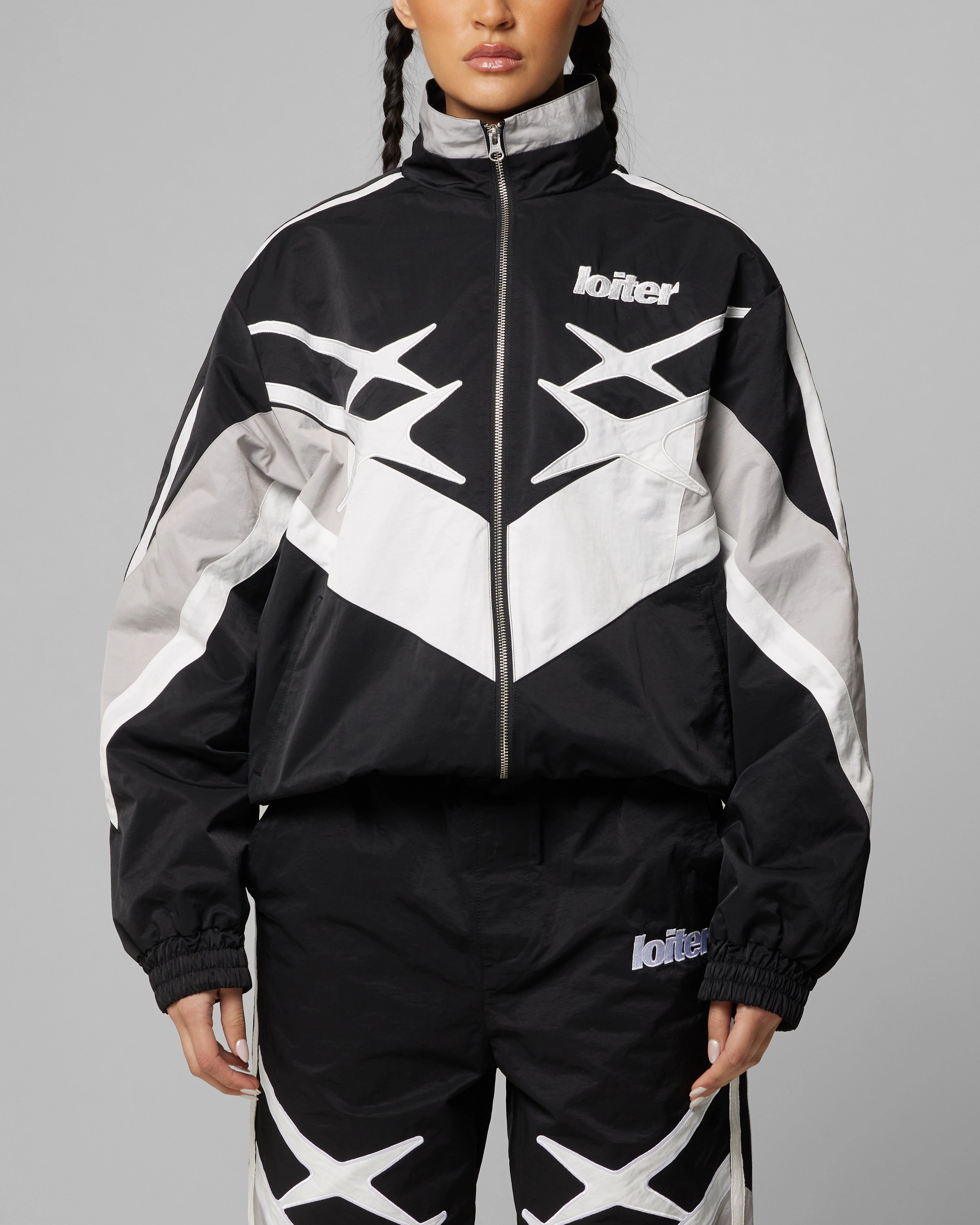 Taped Neckline Seams Show Loiter Hybrid Track Jacket Black/Grey