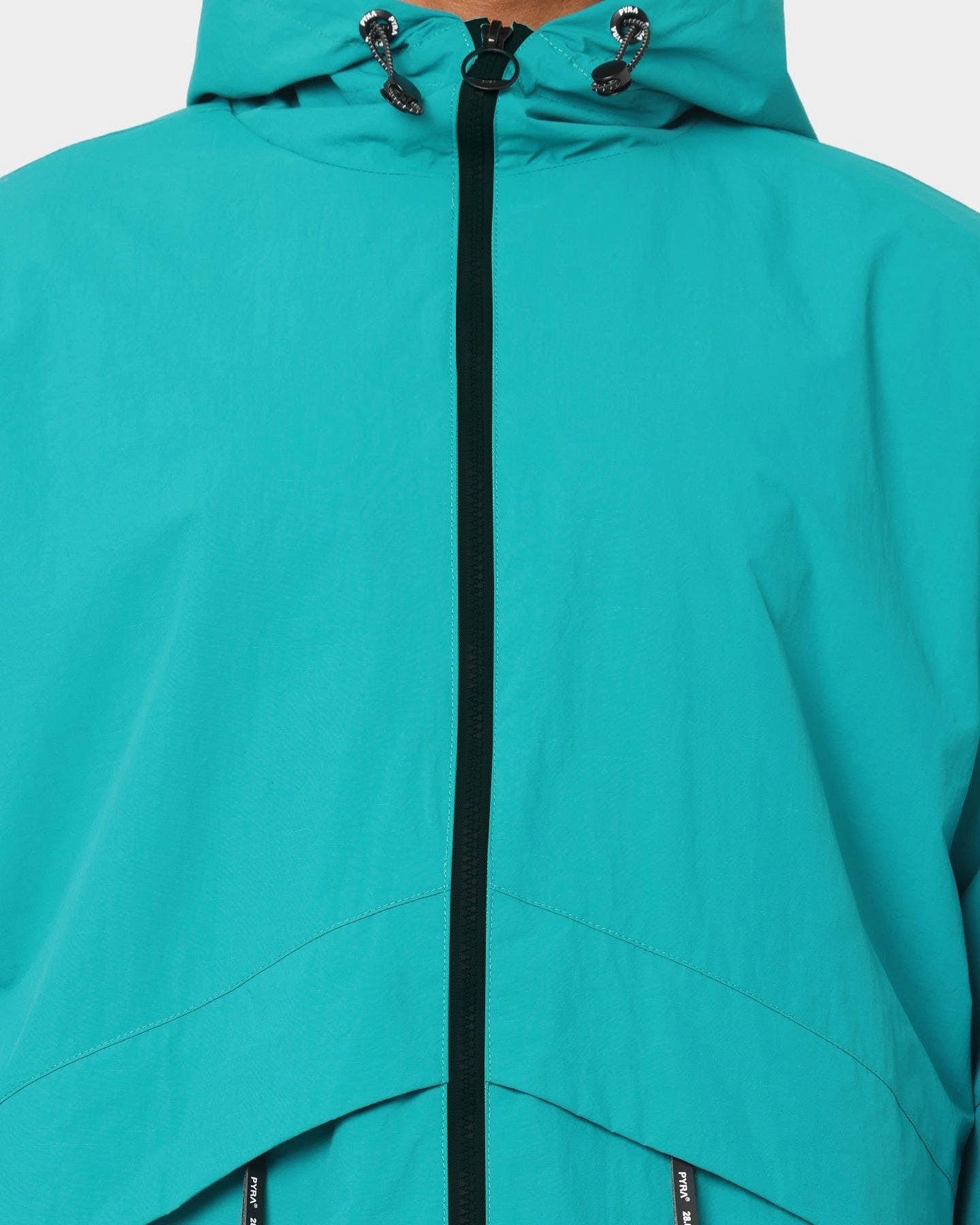 Non Restrictive Silhouette Sport Comfort PYRA Terrain Shell Jacket Teal