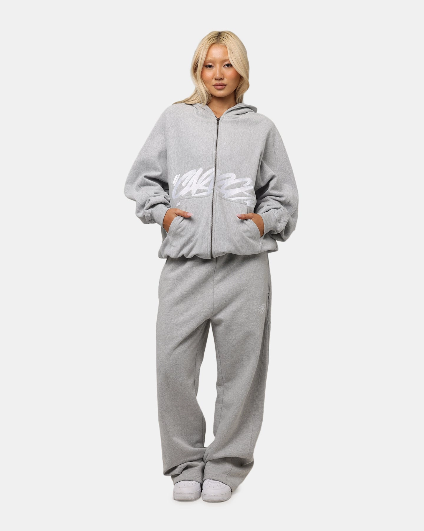 Carre Grit Zip Hoodie Grey Marle Compact Packable Design