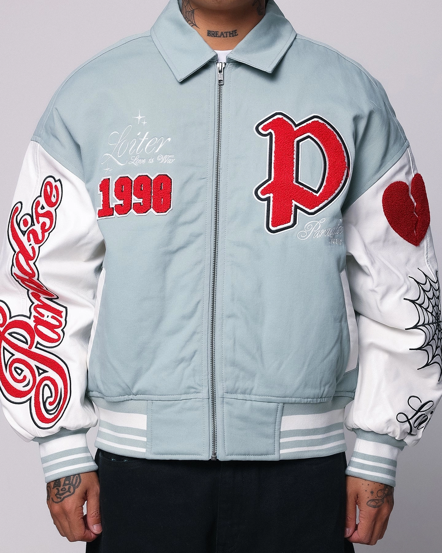 Loiter Paradise Varsity Jacket Light Blue Raglan sleeves