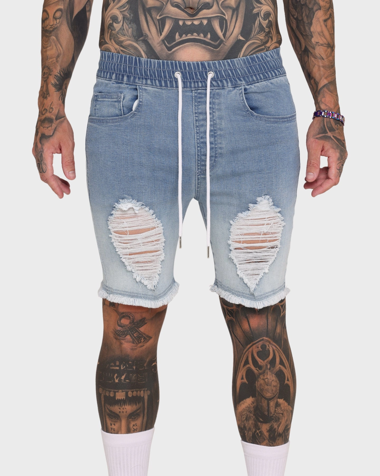 EN ES Gunner Skinny Ripped Shorts Gradient Blue Eco Conscious Packaging Reflective Safety Details