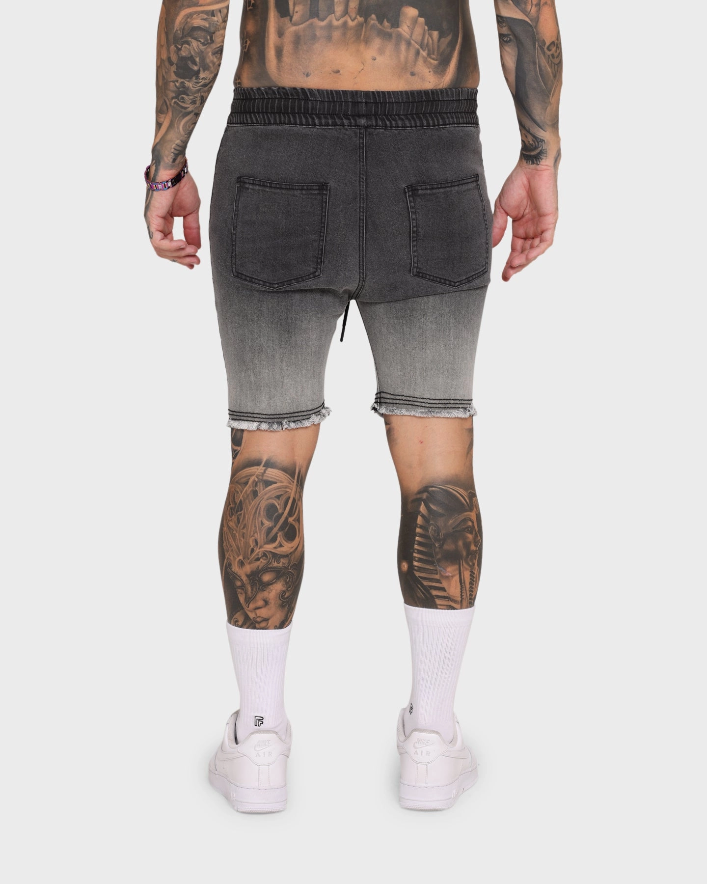 WindResistantWeave Relaxed Design EN ES Gunner Skinny Ripped Shorts Gradient Black