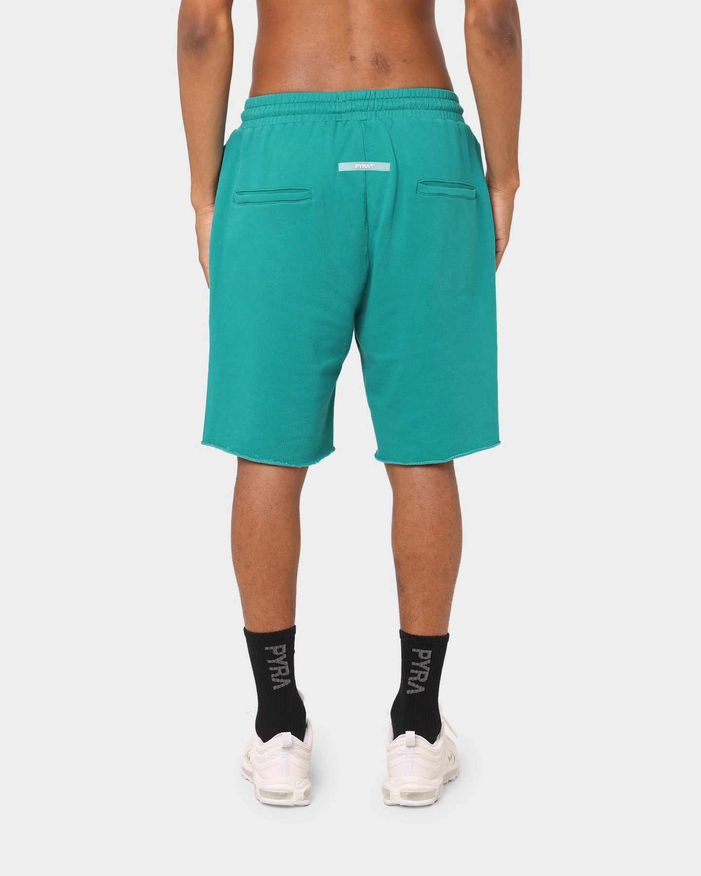 PYRA Raw Slouch Shorts Teal stretchy design