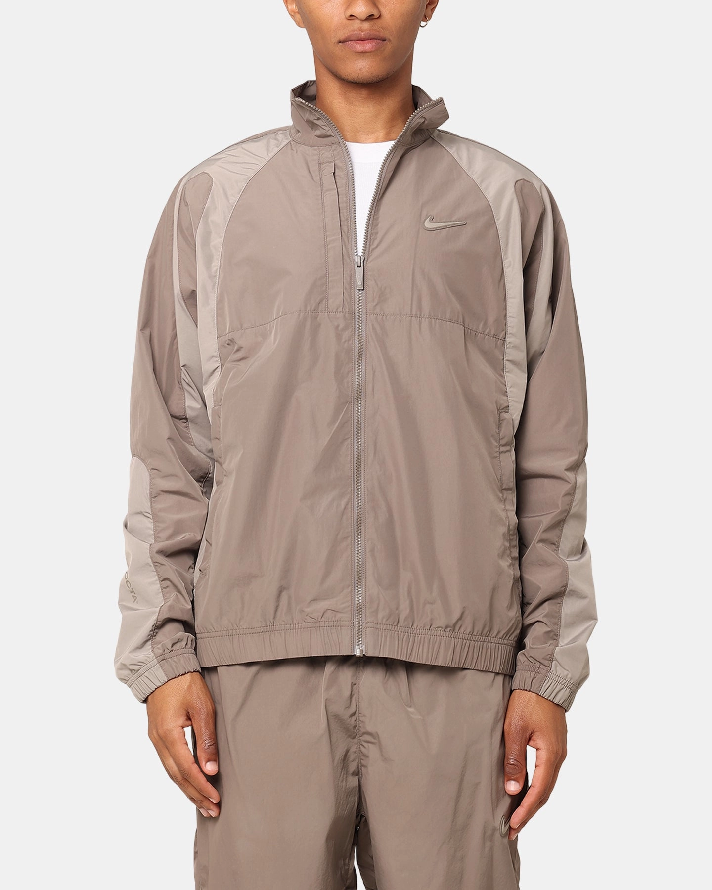 Hearing-aid Nike Nocta Northstar Nylon Track Jacket Olive Grey