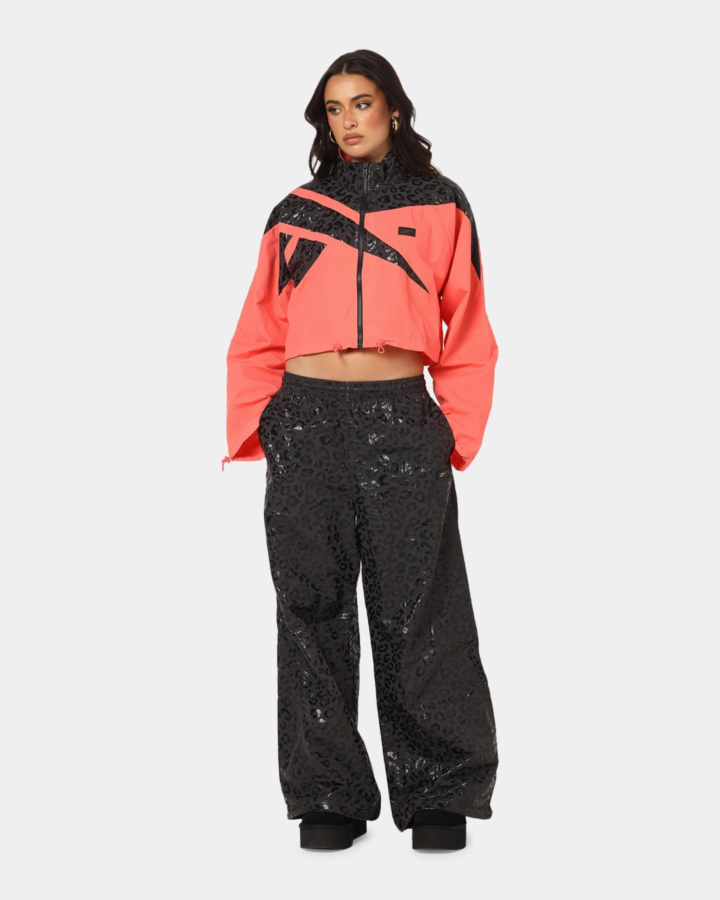 Urban Protection Statement Piece Reebok X Angel Reese Women's Vector Track Jacket Coral