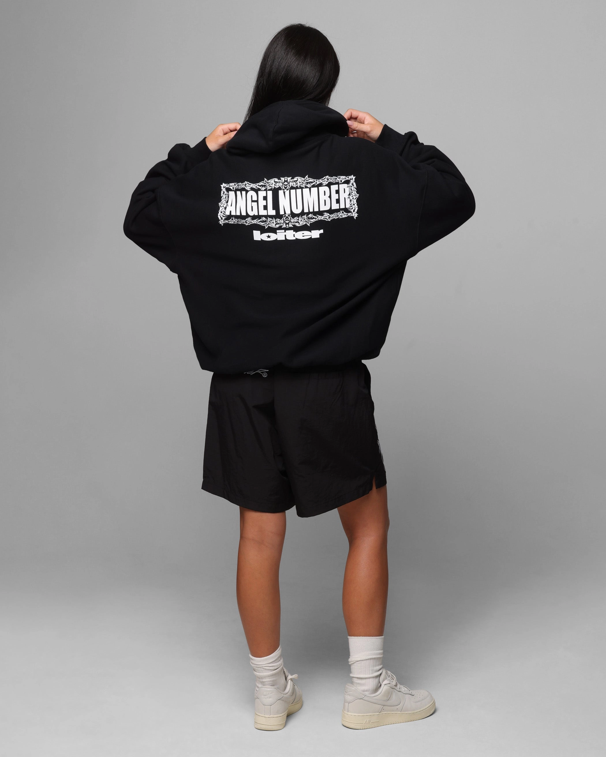 Flexible Fit Loiter Angel Number Hoodie Black