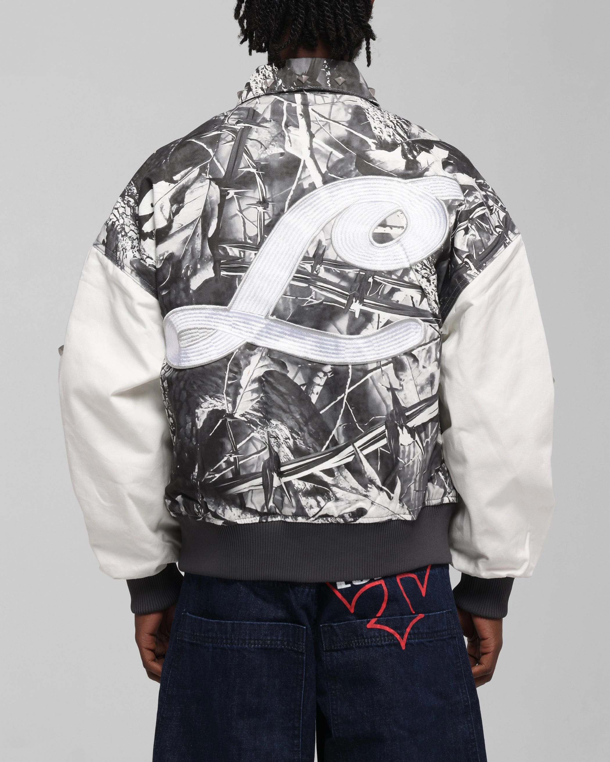 Layered Protection Checked Loiter Frontier Varsity Jacket Real Tree Camo