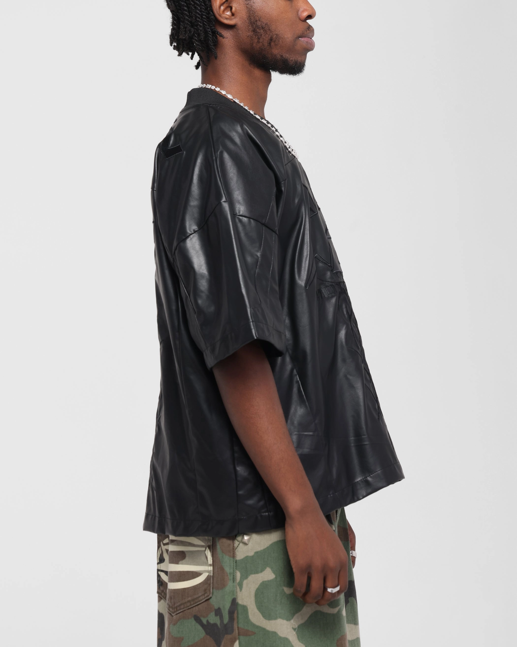 Laser Cut Edge Loiter Vegan Leather Football Top Black