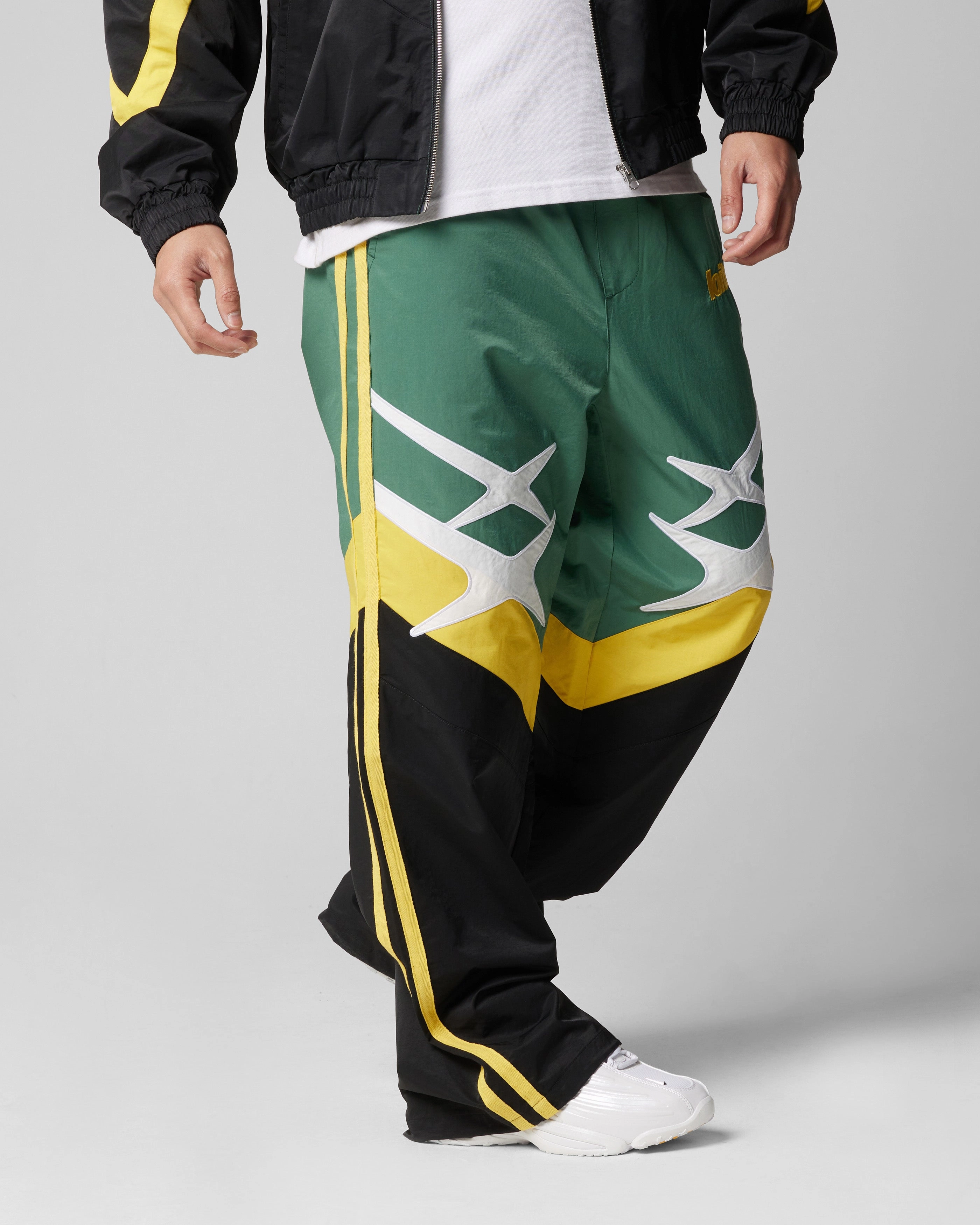 Loiter Hybrid Trackpants Green/Yellow Functional Fit Comfort Design