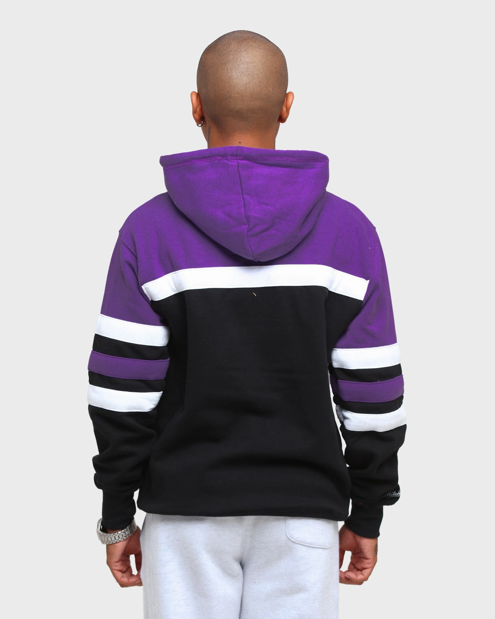 Mitchell & Ness Men's Toronto Raptors Head Coach Hoodie Black/Purple Seasonal Function Minimal Form