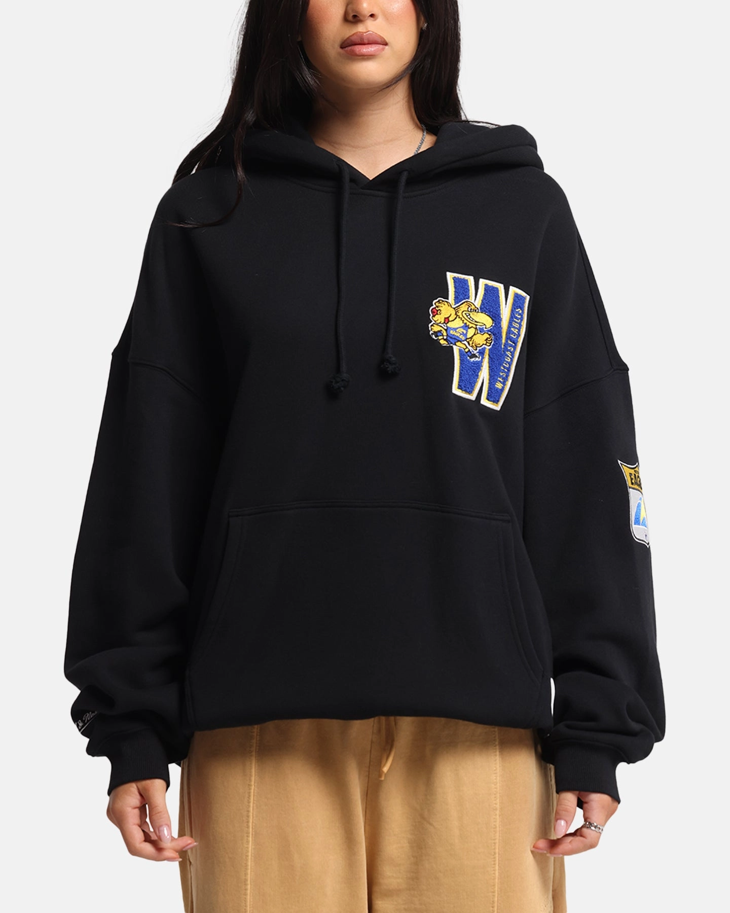 Thermoregulating Insulation Performance Outerwear Mitchell & Ness West Coast Eagles Team Hoodie Solid Black