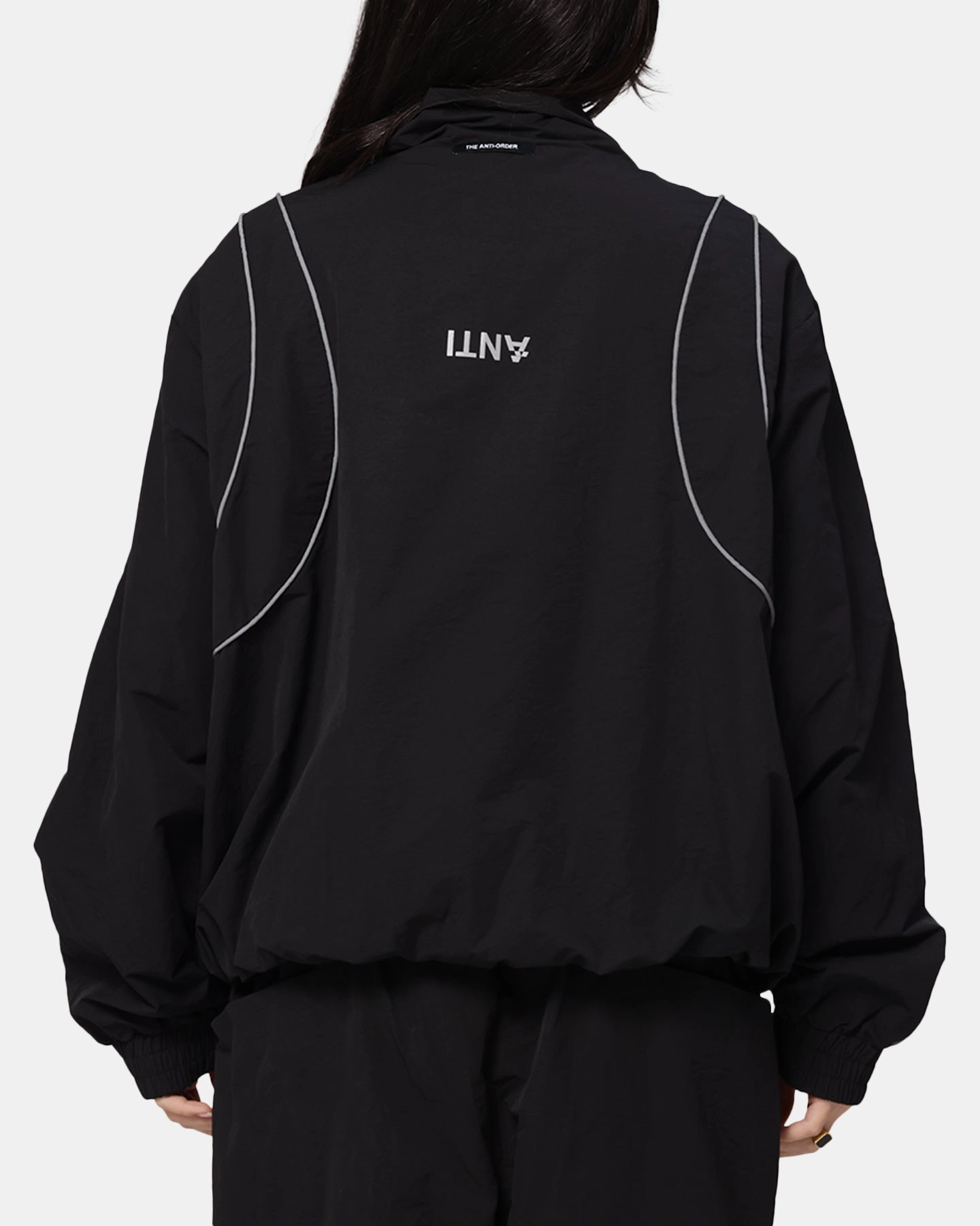 The Anti Order Stereo Nylon Track Jacket Black Generosity yoga enthusiasts