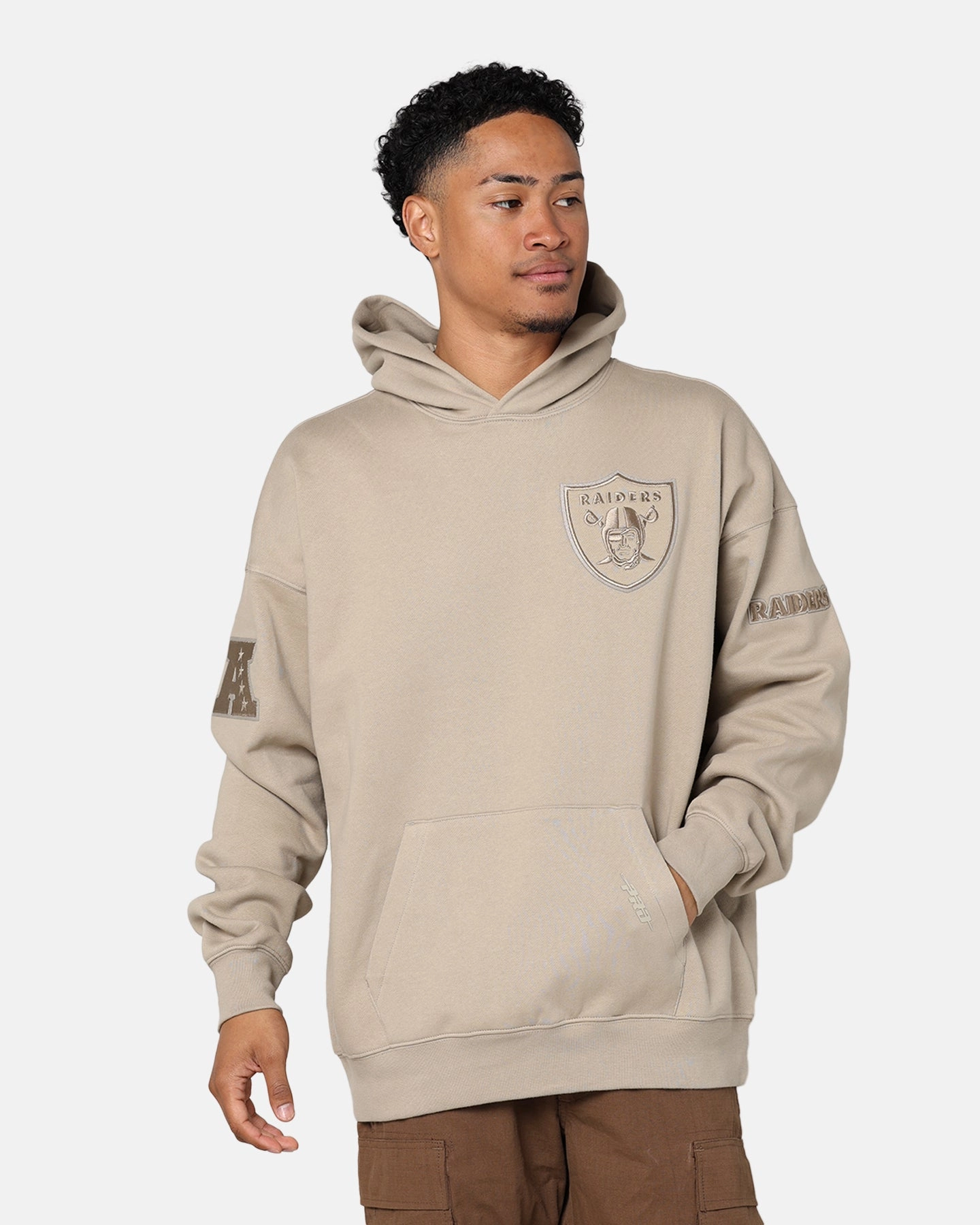 label Draw Pro Standard Las Vegas Raiders Drop Shoulder Hoodie Taupe