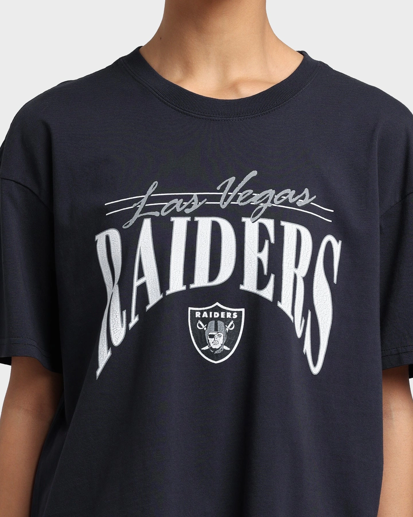 Majestic Athletic Women's Las Vegas Raiders Vintage NFL Logo T-Shirt Faded Black Chic Outfit