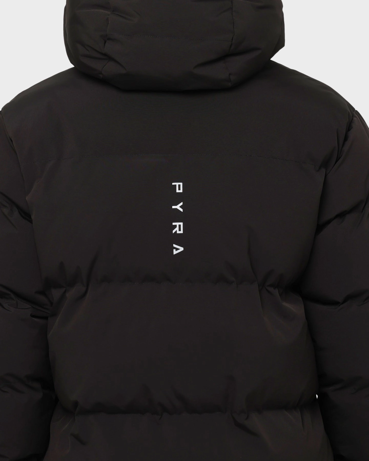 beach scene PYRA Alpine Puffa Jacket Black