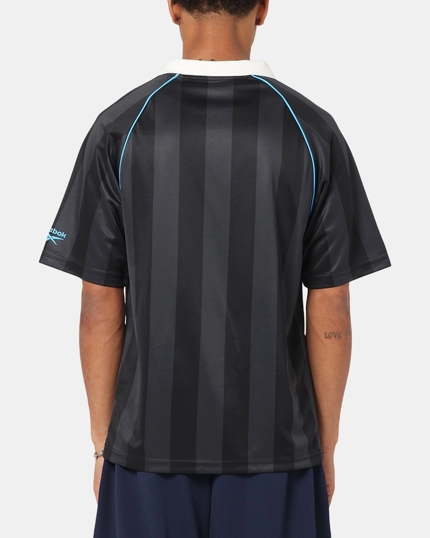 Flattering Drop Shoulder Reebok Retro Footy Polo T-Shirt Black
