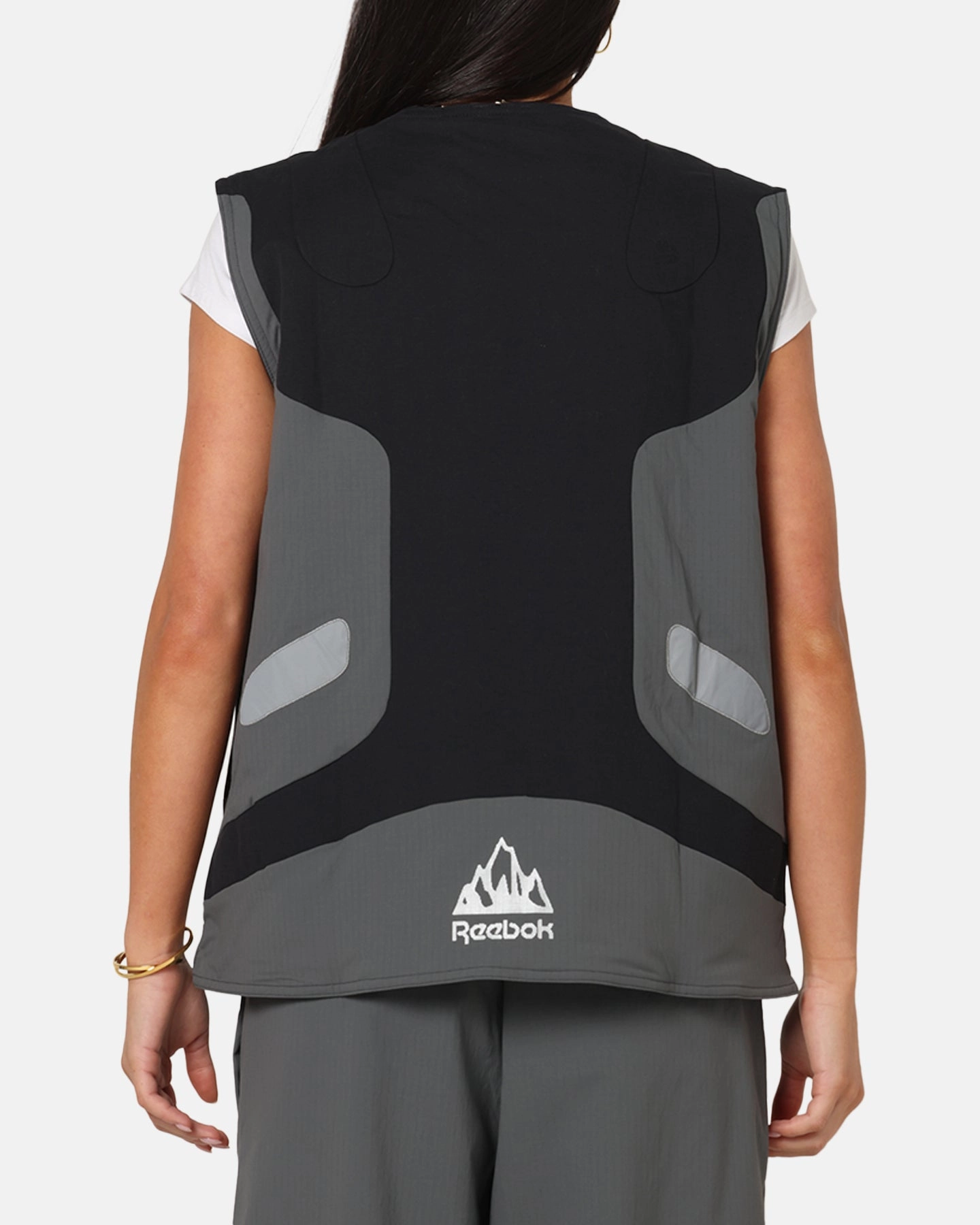 AirflowVents Hidden Storage Compartment Reebok X Market Reversible Vest Black/Silver