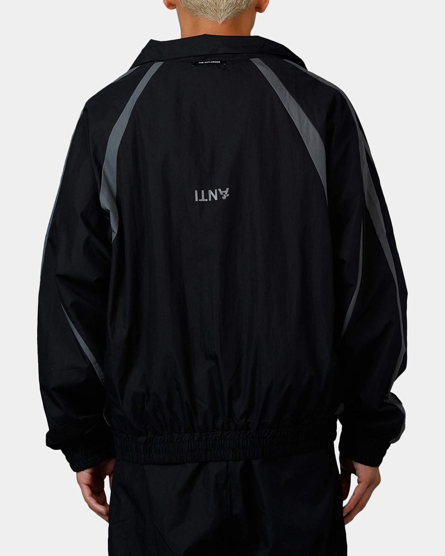 The Anti Order Acolyte Windbreaker Jacket Black/Grey Safari
