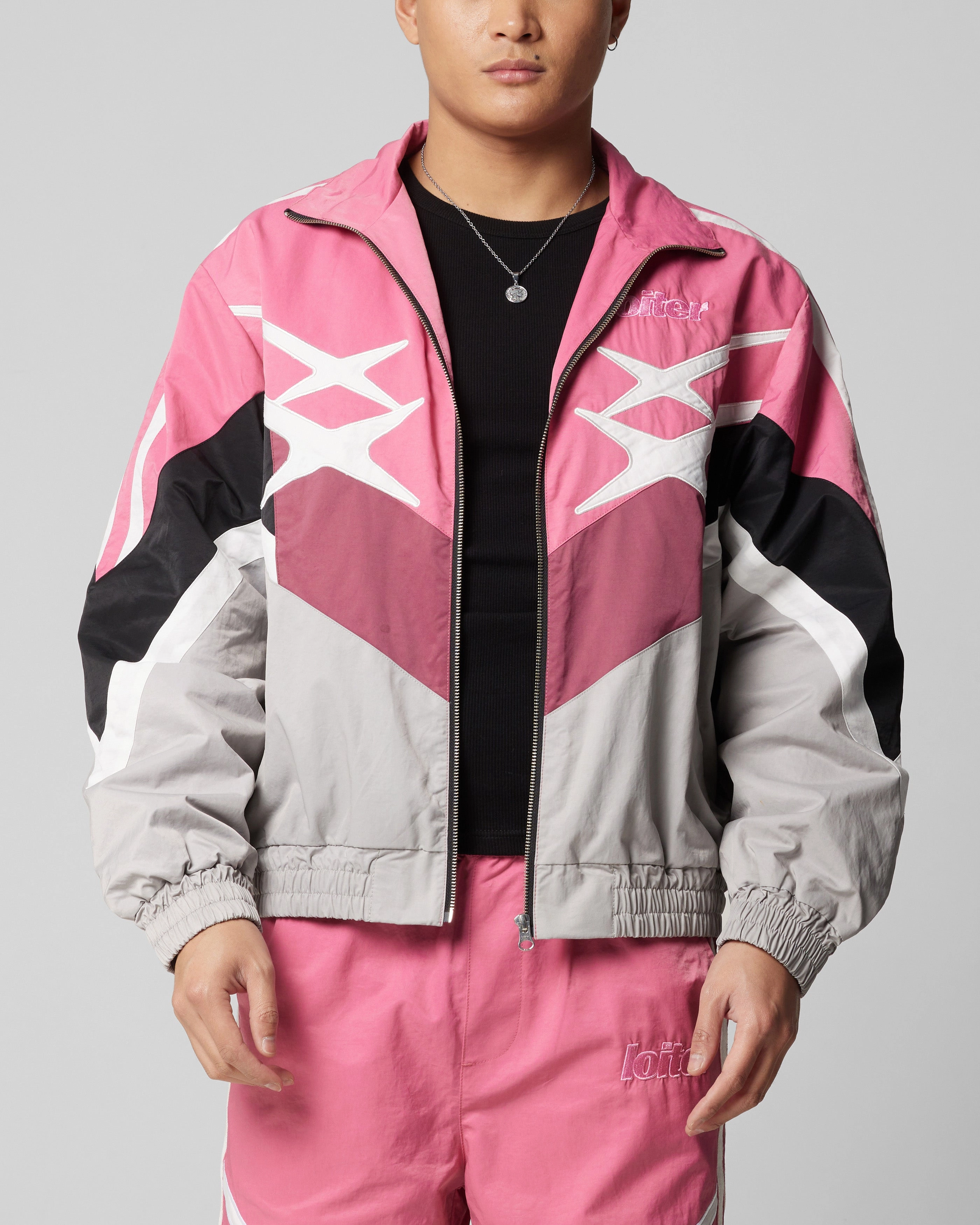Loiter Hybrid Track Jacket Pink/Grey fireplace