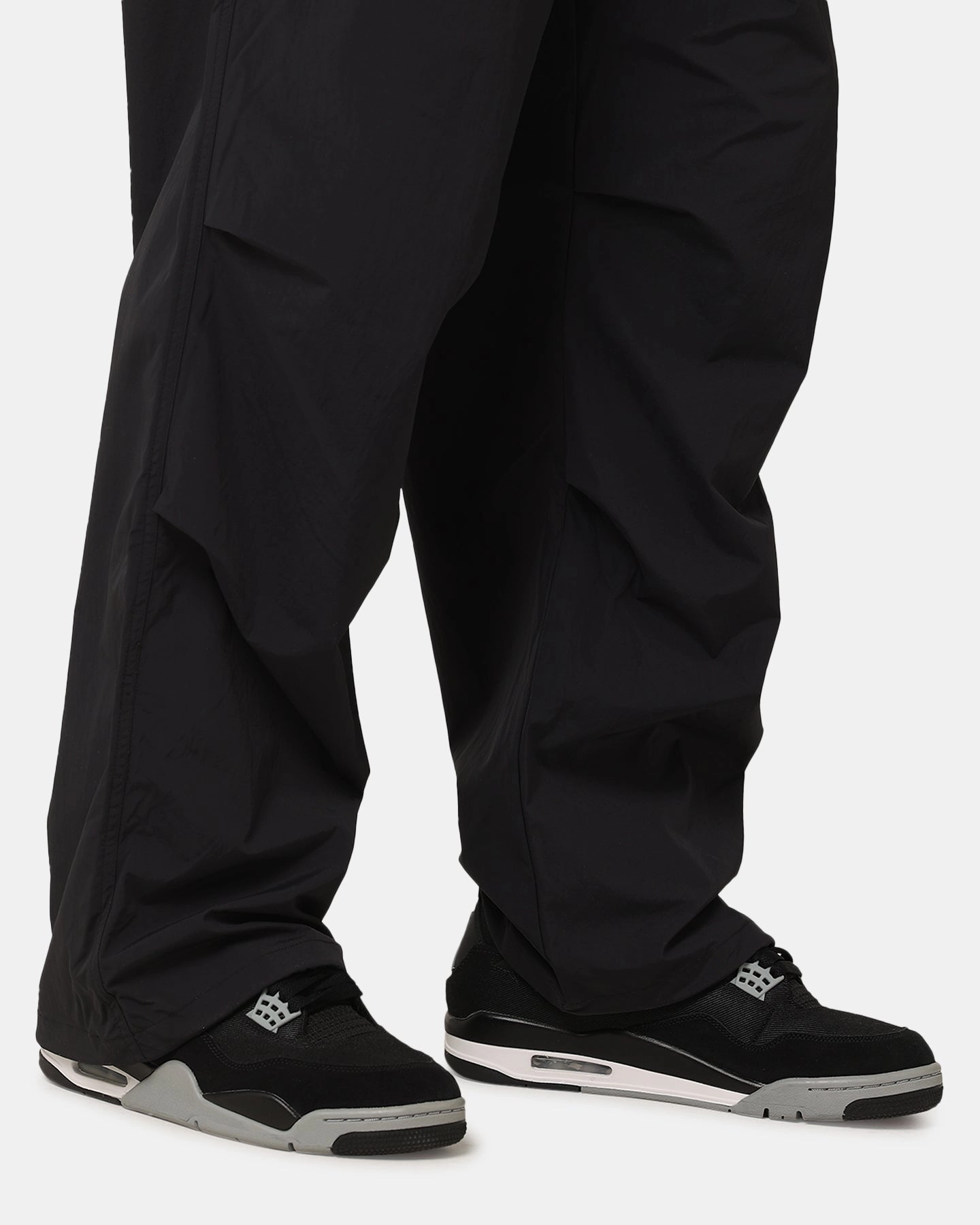 Jordan Essential Statement Woven Pant Black NonBindingWaistline Tapered ankle