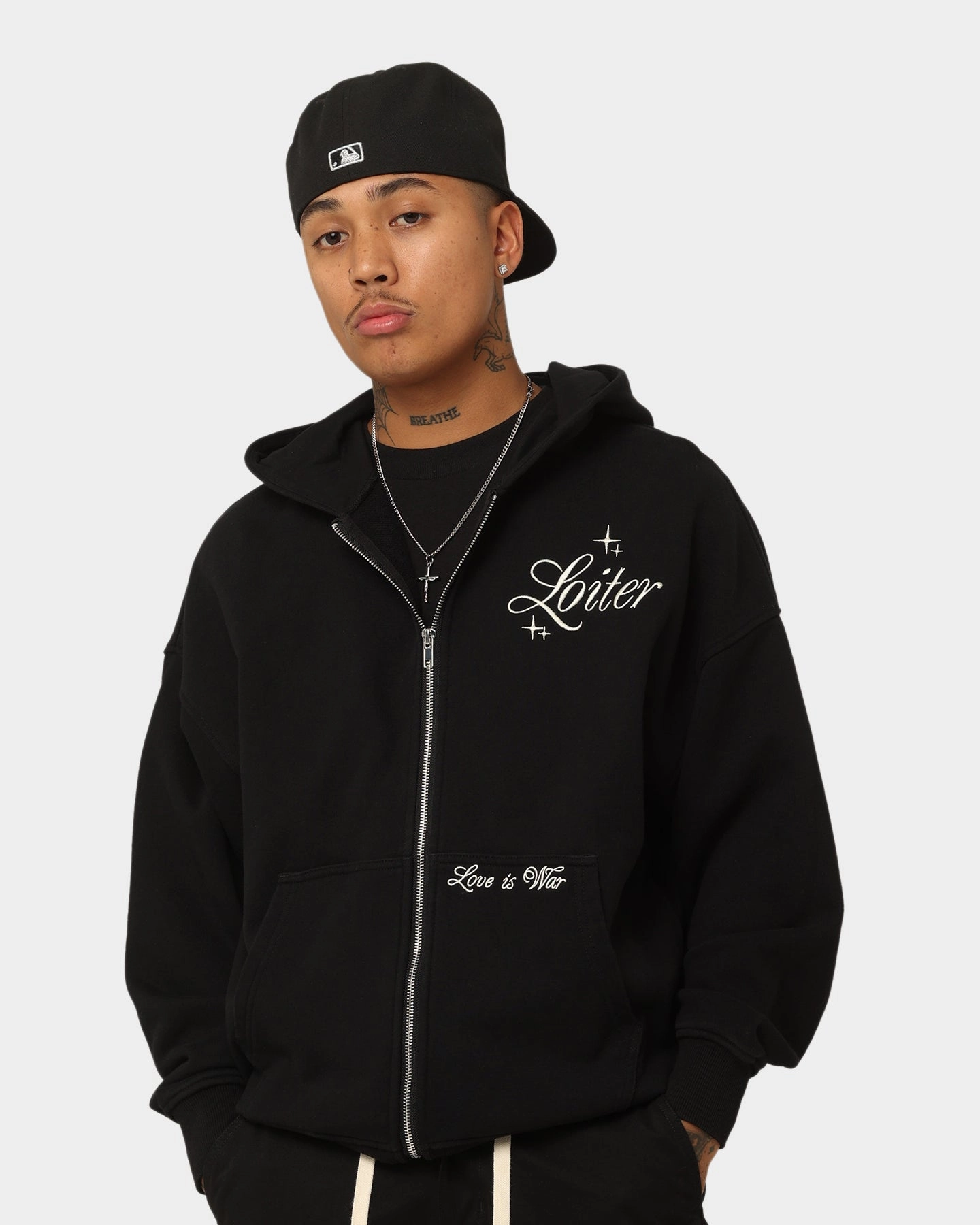 Loiter Paradise Zip Hoodie Off Black Folder Compression Strap Adjustment