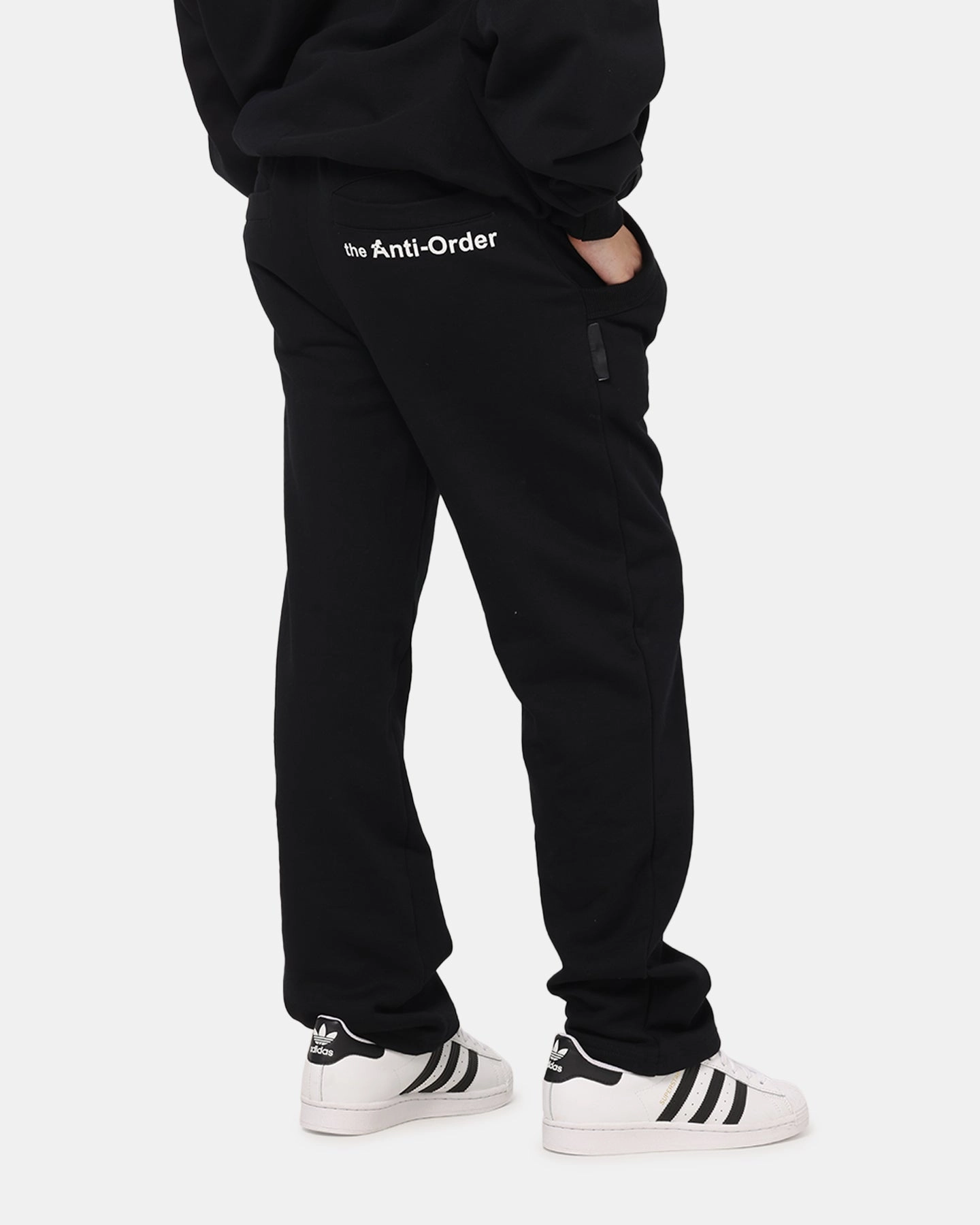 Modern Design The Anti Order Reverse Logo Track Pants Black