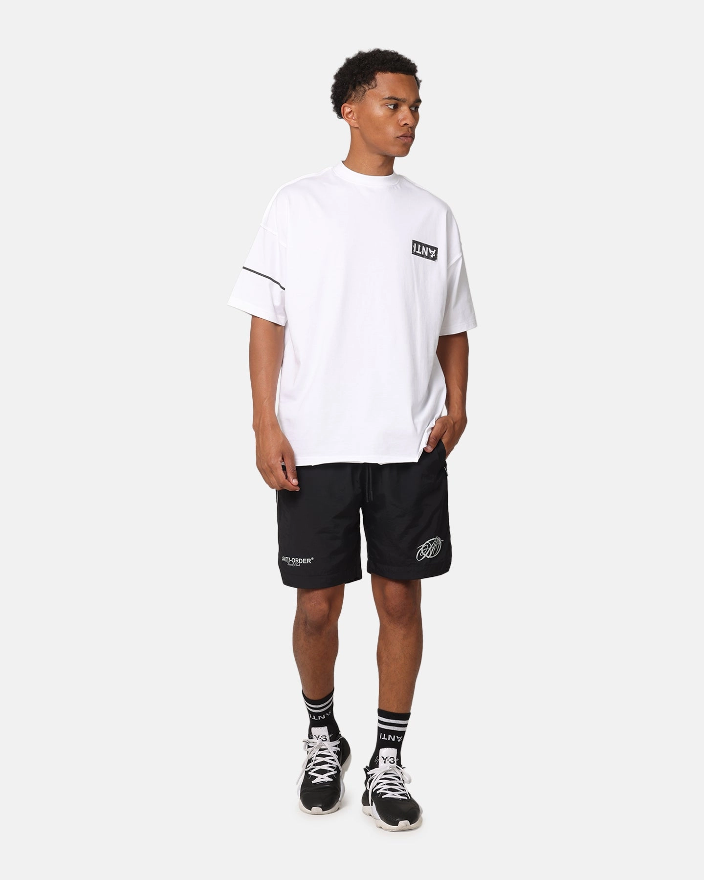 The Anti Order Track Club Nylon Shorts Black/White button-down look transportation industry