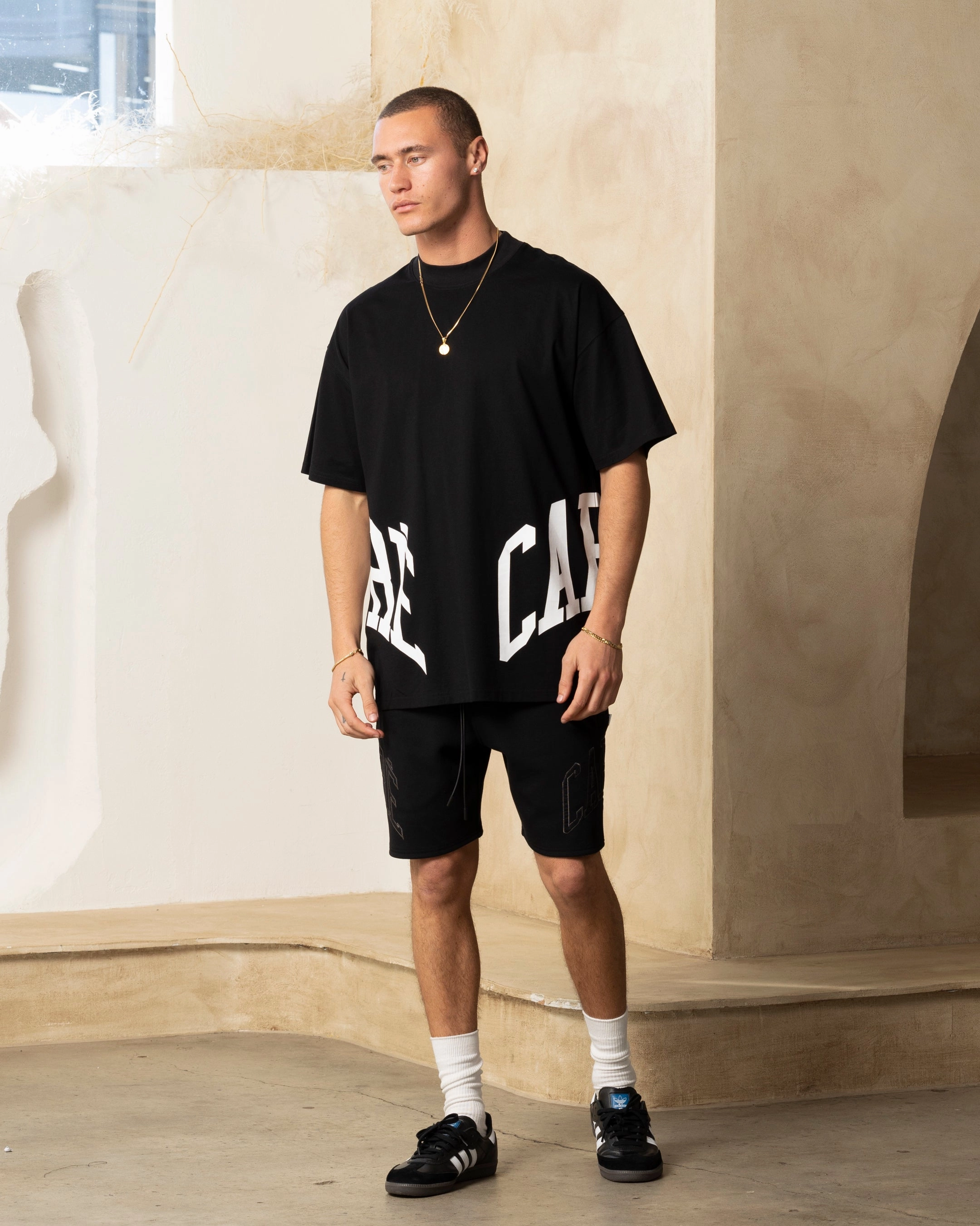 Playful Prints Versatile and Comfortable Carre Double Arch Oversized T-Shirt Black