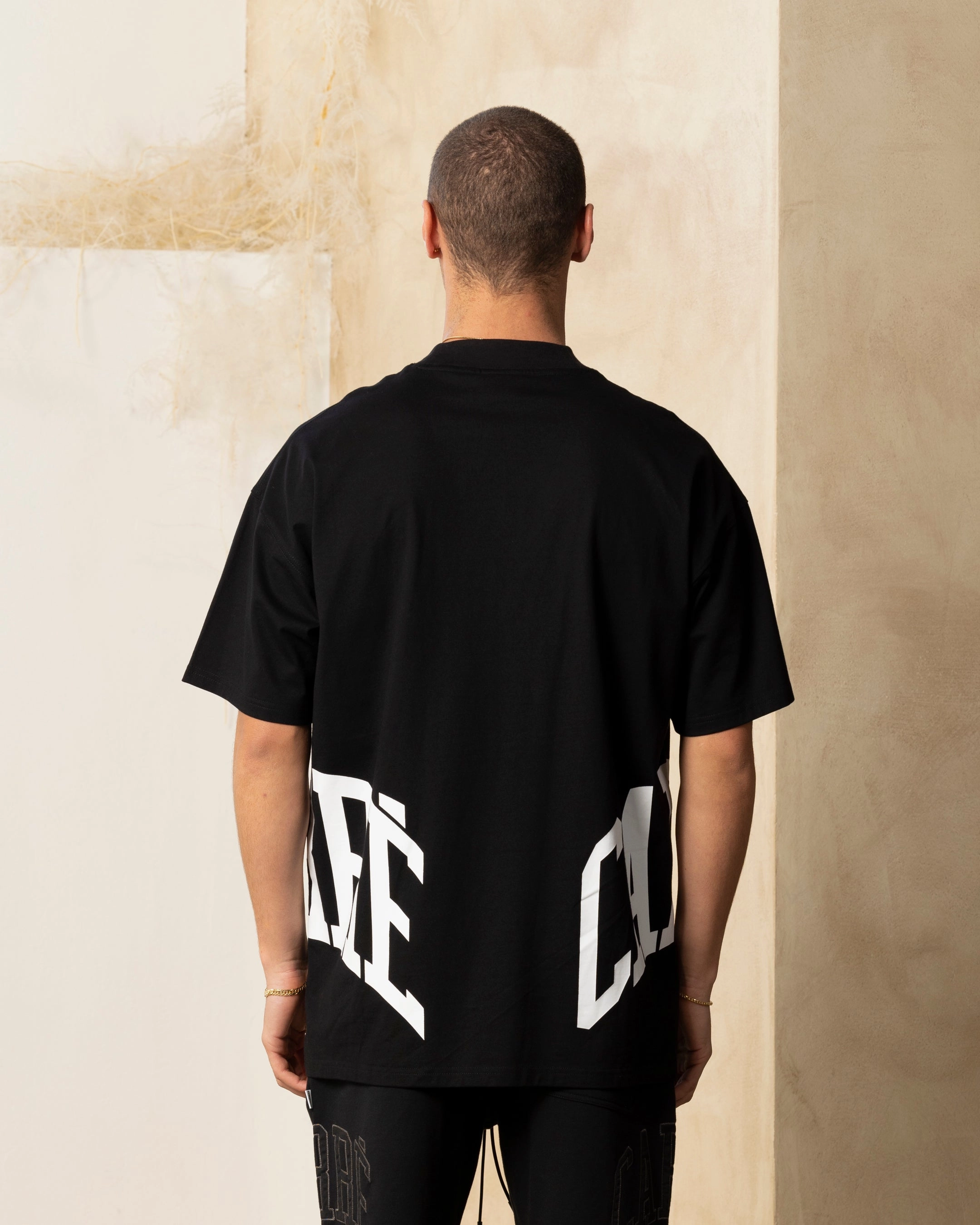 Carre Double Arch Oversized T-Shirt Black Moisture Wicking Fabric Weekend Fashion