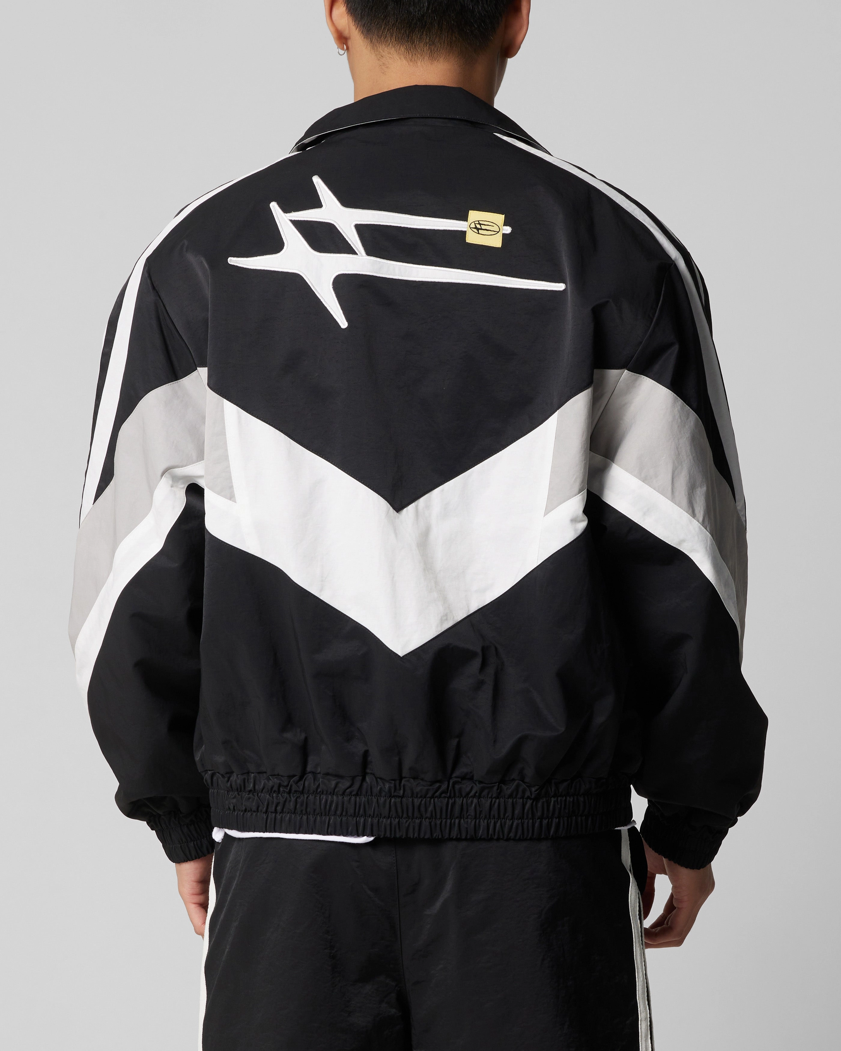 Loiter Hybrid Track Jacket Black/Grey Goal elastic waistband