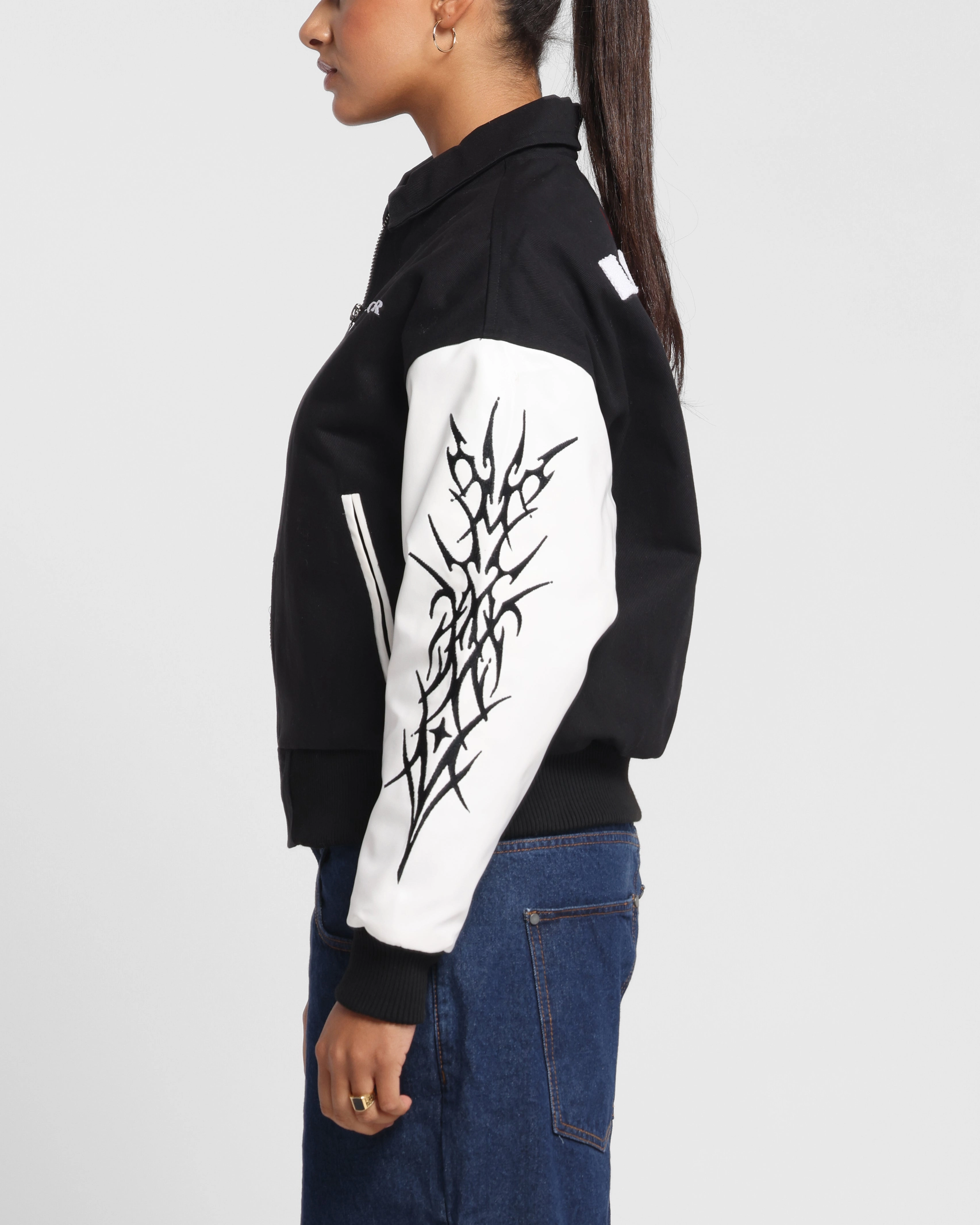 HydrationCompatible Pocket Brush Loiter Cyber Varsity Jacket Black/White