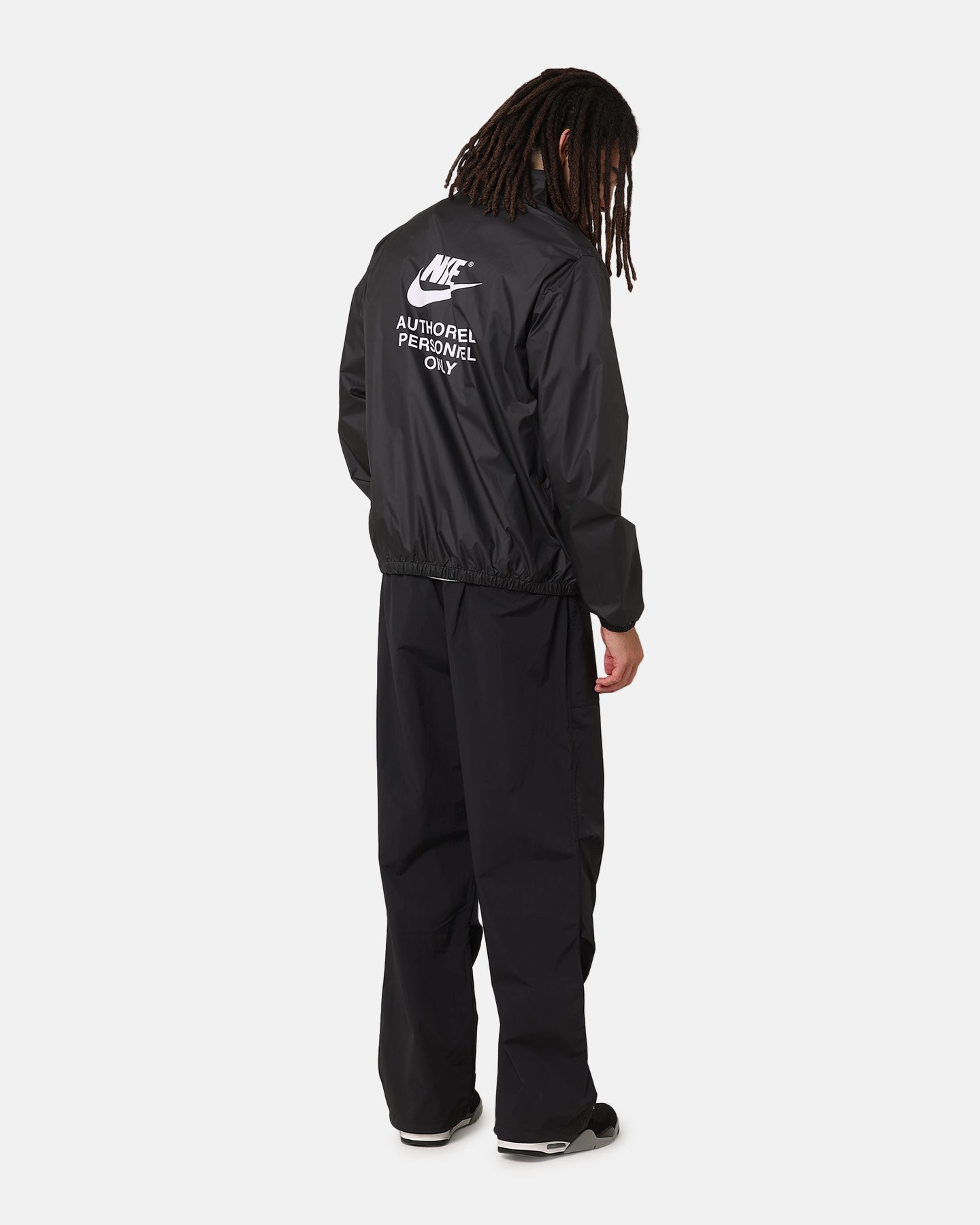 color - coordinating Slim-fit Nike Woven Full Zip Jacket Black/Black