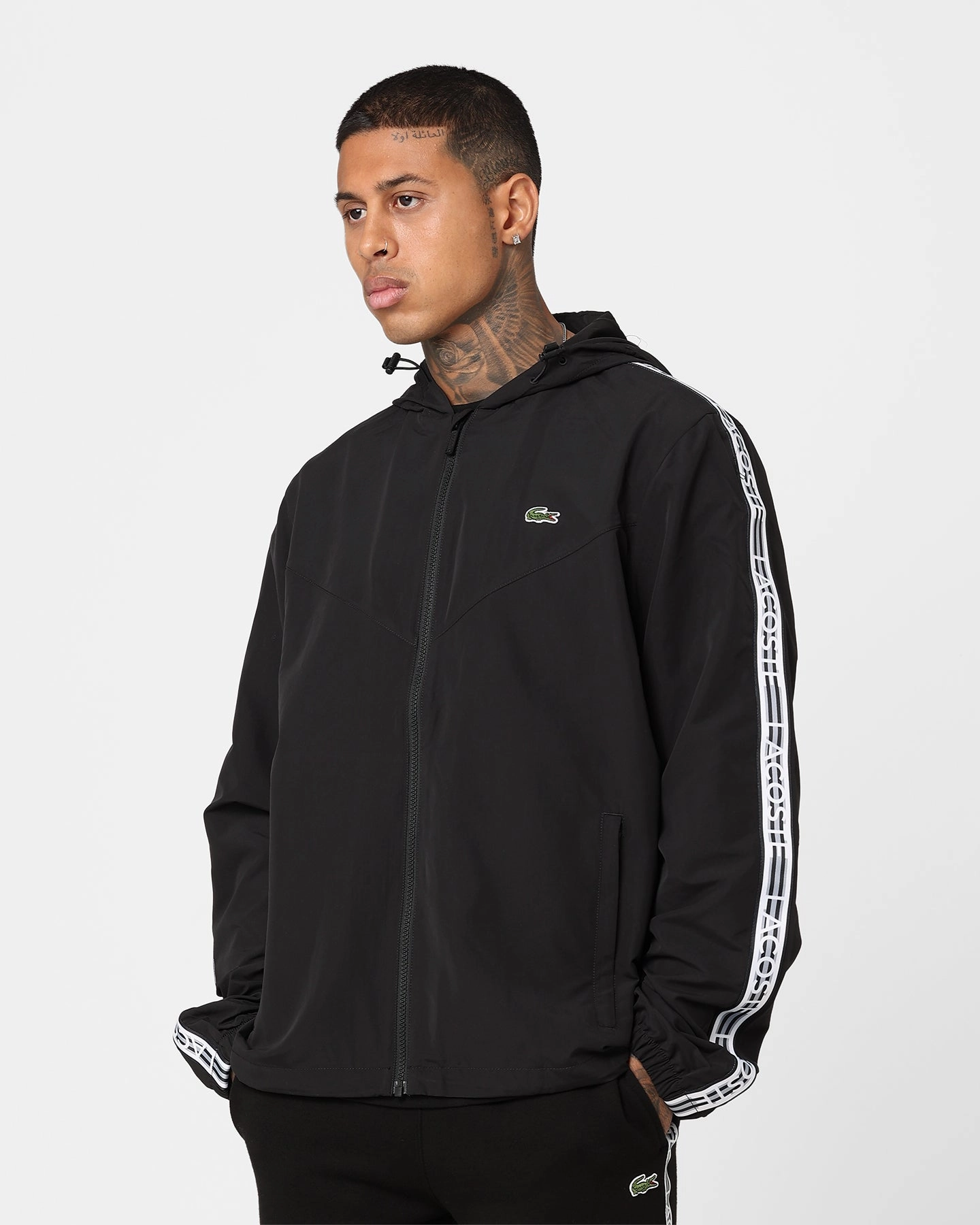 Lacoste Logo Tape Recycled Poly Windbreaker Jacket Black Evolve Strategy